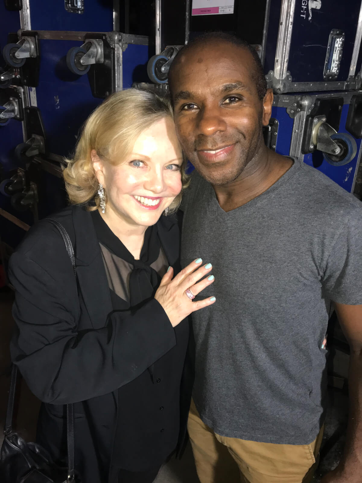 Susan Stroman with Associate Choreographer of West End’s The Scottsboro Boys and Young Frankenstein, Richard Pitt. Both are backstage in front of blue equipment storage boxes.