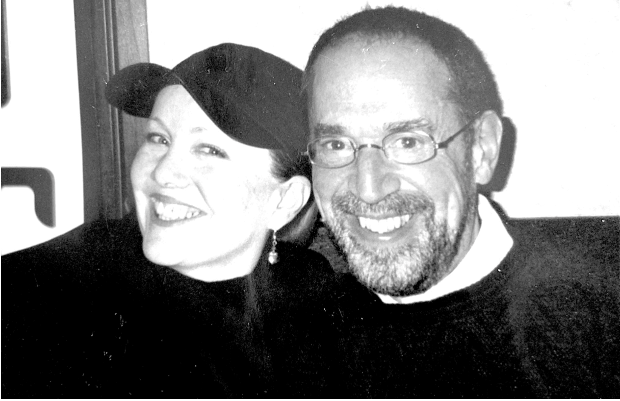 Black and white photo of Susan Stroman with Production Stage Manager, Steven Zweigbaum. Stroman is in her signature black hat.
