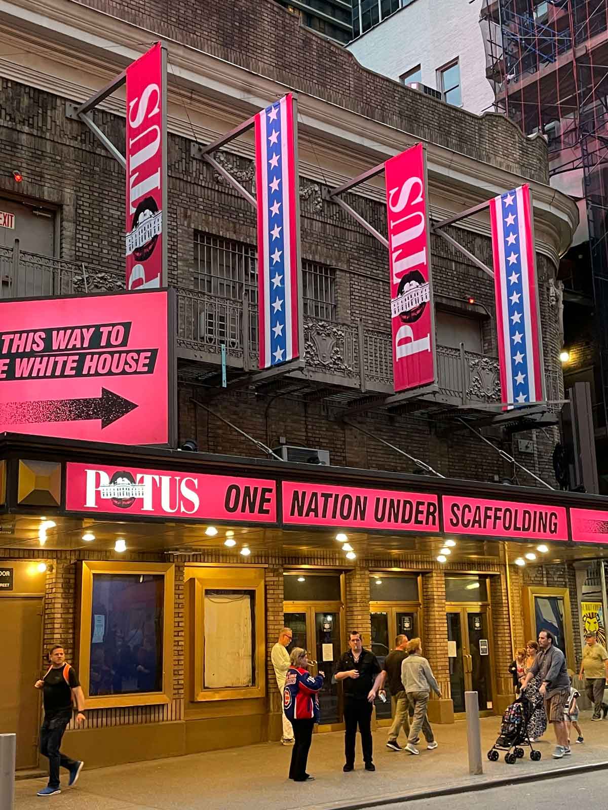 The POTUS marquee at the Shubert Theatre. It is bright pink.