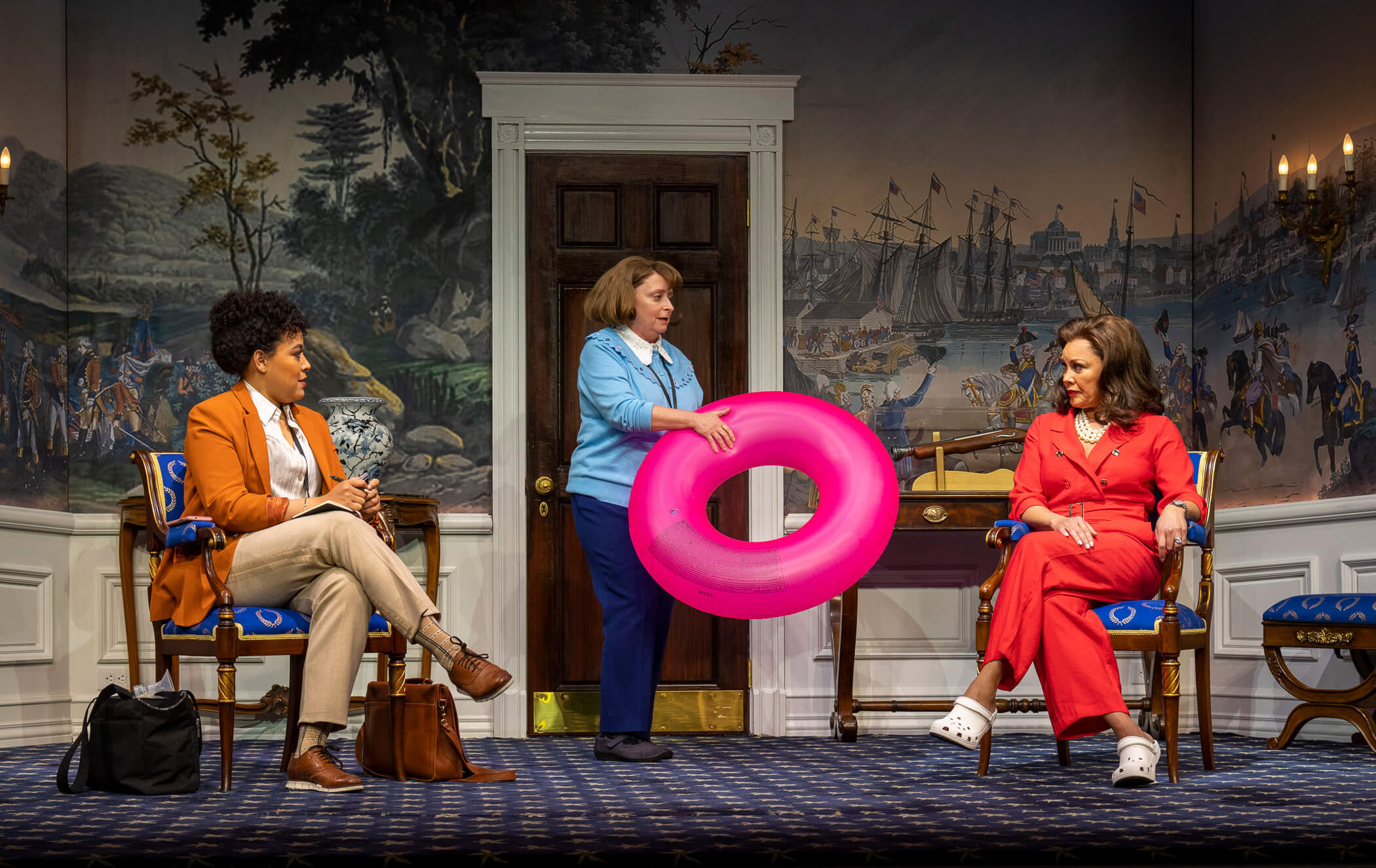 Lilli Cooper, Rachel Dratch, and Vanessa Williams onstage in POTUS. Dratch holds a pink inflatable donut.