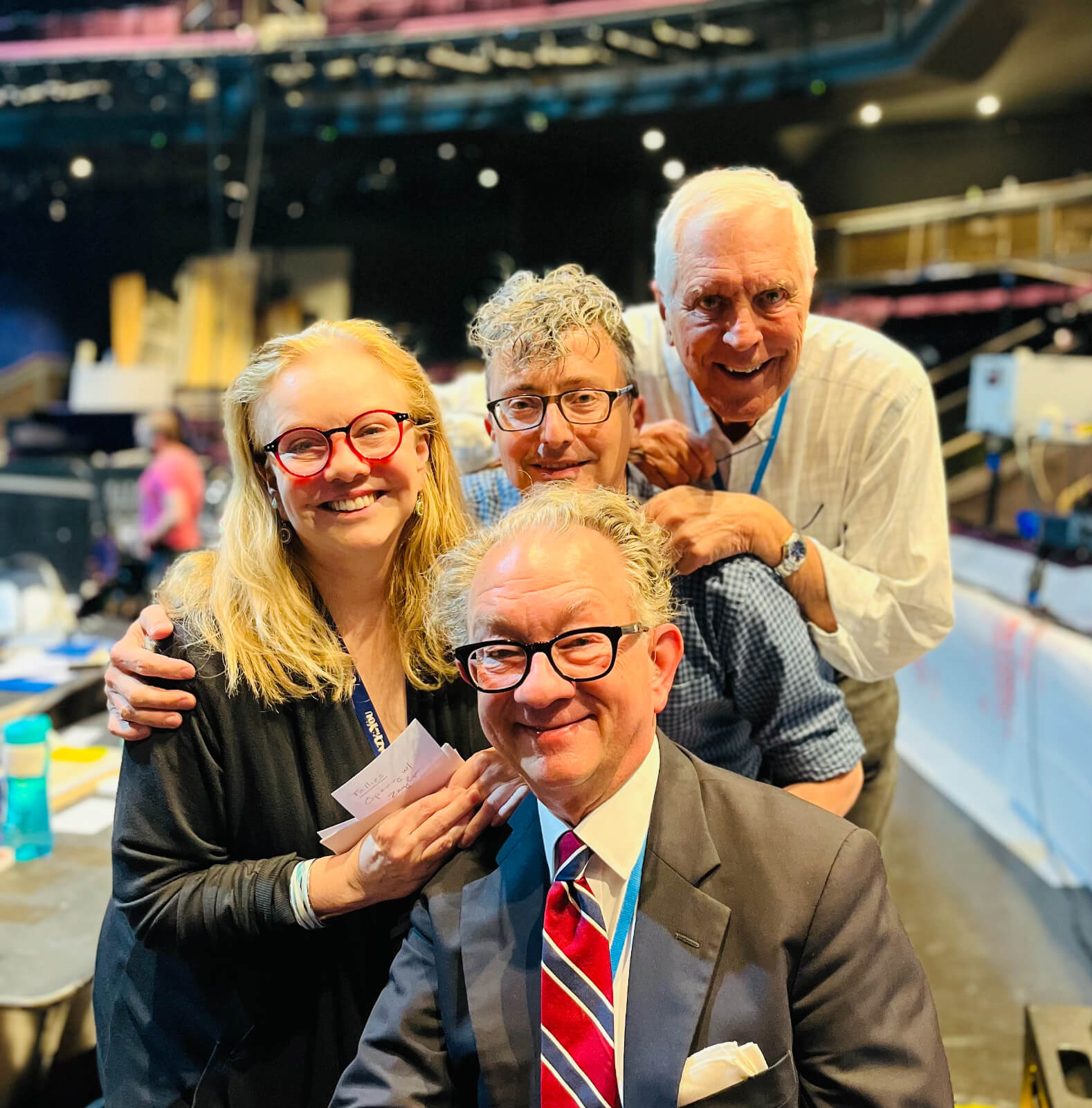 Director Susan Stroman in the house of the Gillian Lynne Theatre with designers William Ivey Long, Beowulf Boritt, and Ken Billington.
