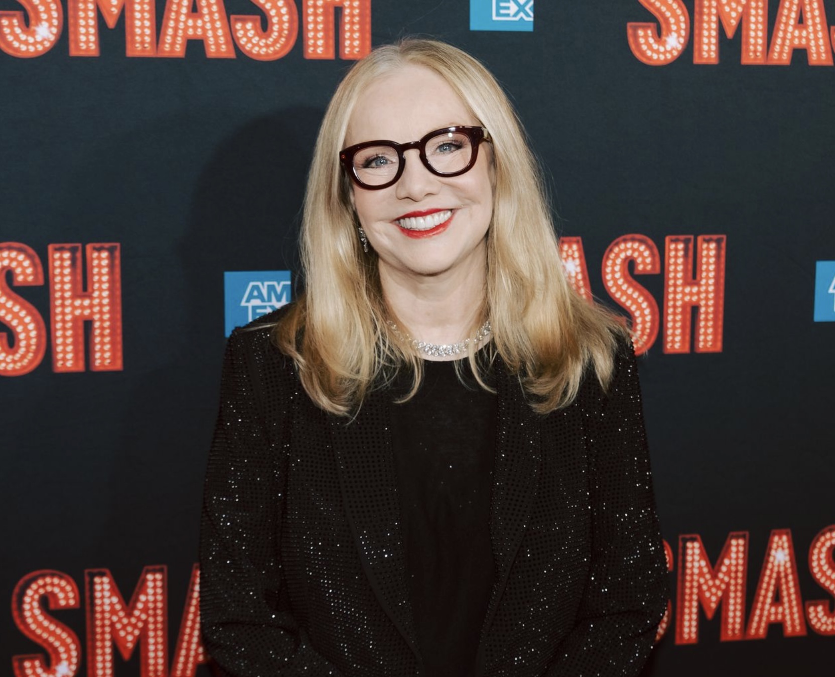 Director Susan Stroman smiles on the red carpet at the SMASH opening night.