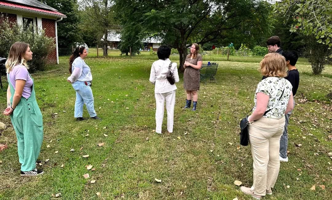 Visitors walking the grounds on a farm tour