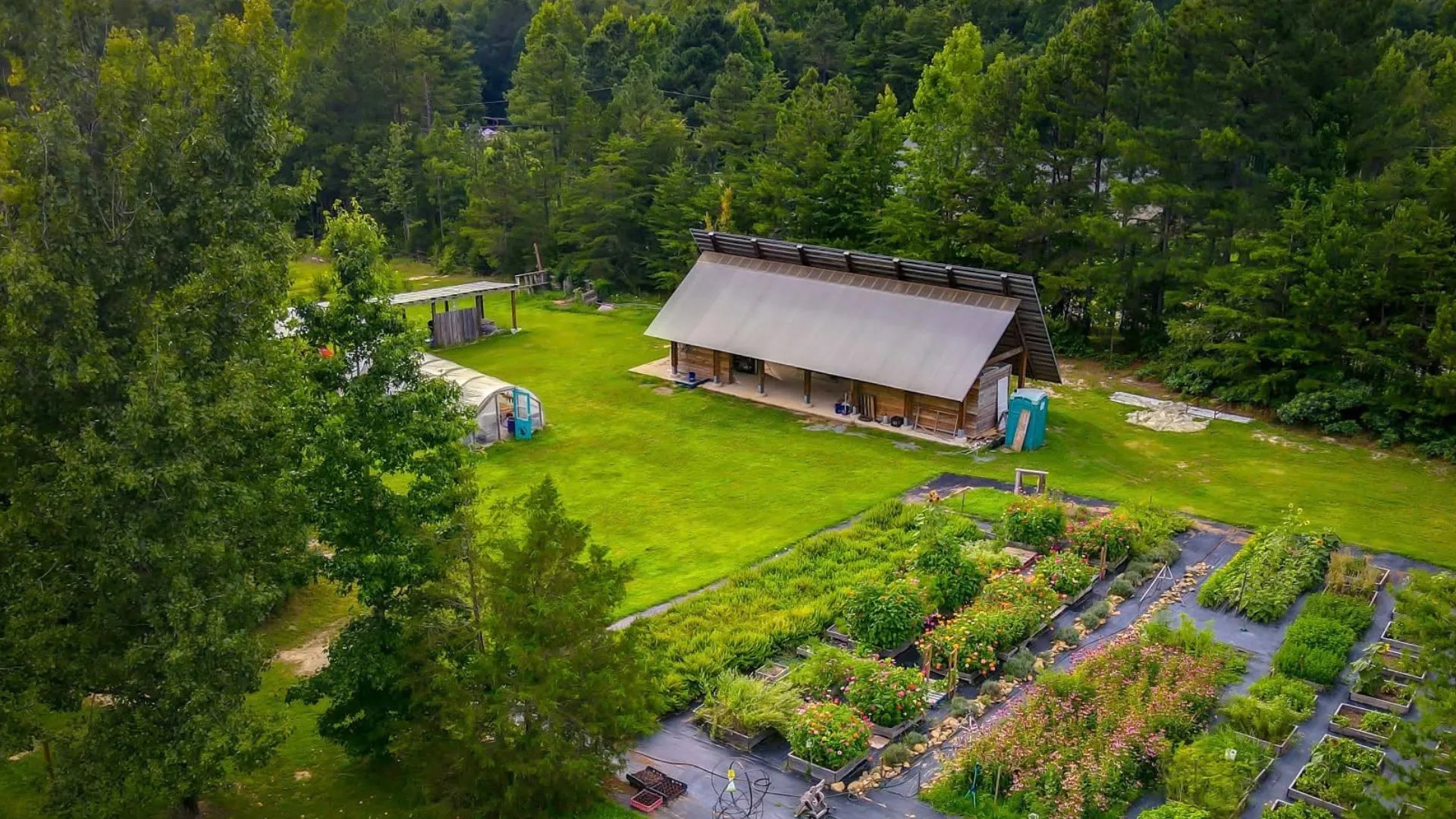 Aerial view of the barn and gardens at Benevolence Farm
