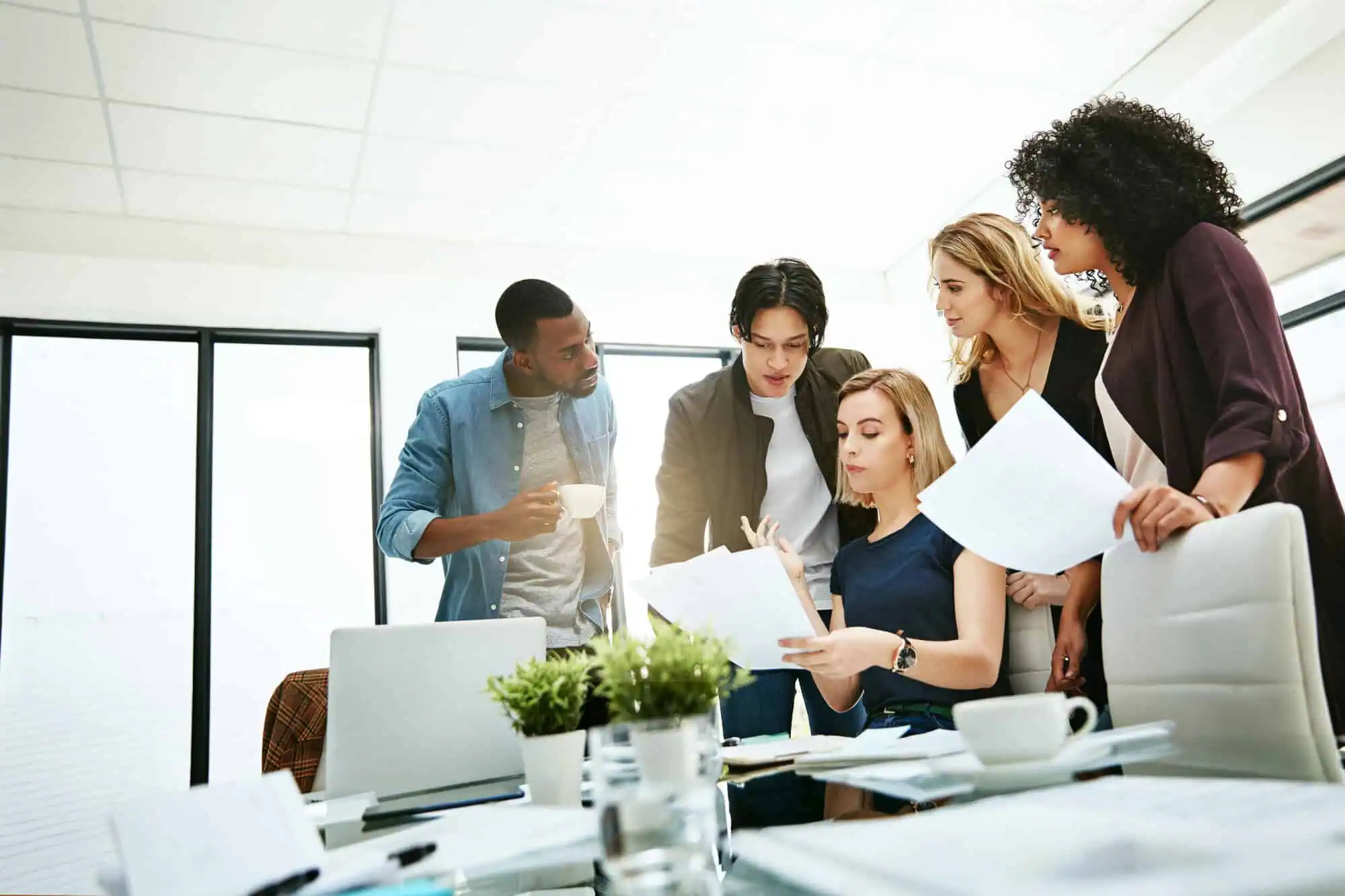 woman advising team financially