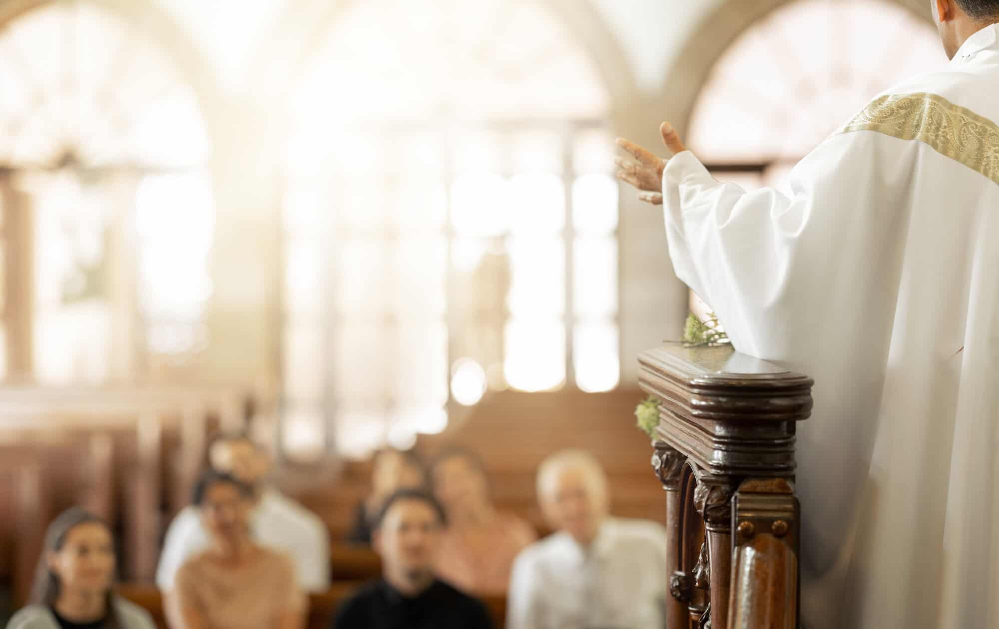 priest in church during sermon