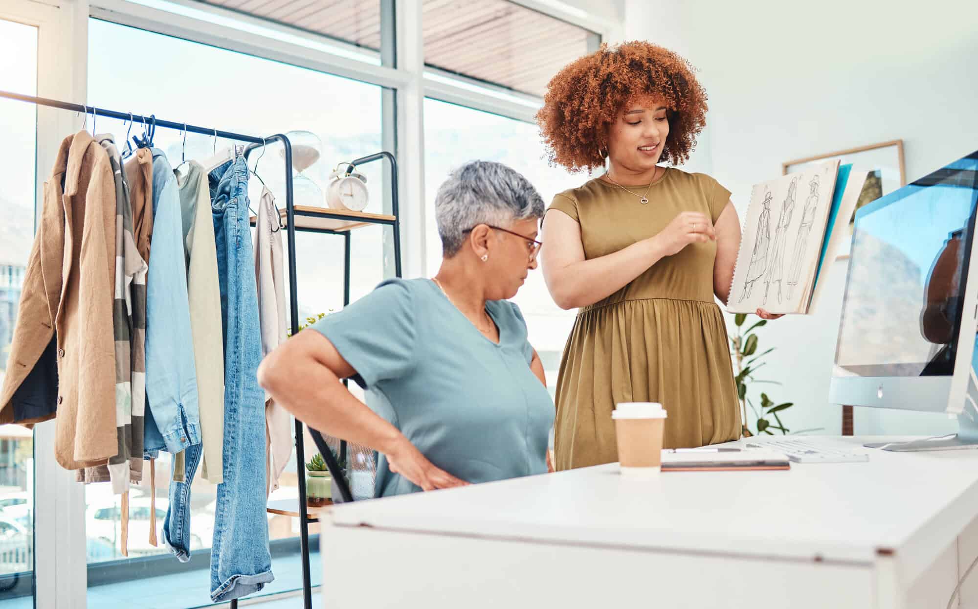 women in retail store working together