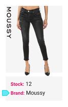 Person wearing black skinny jeans from Moussy brand with pointed black heels on white background.