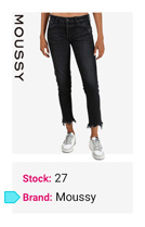 Person wearing black frayed hem jeans and silver sneakers on a white background.