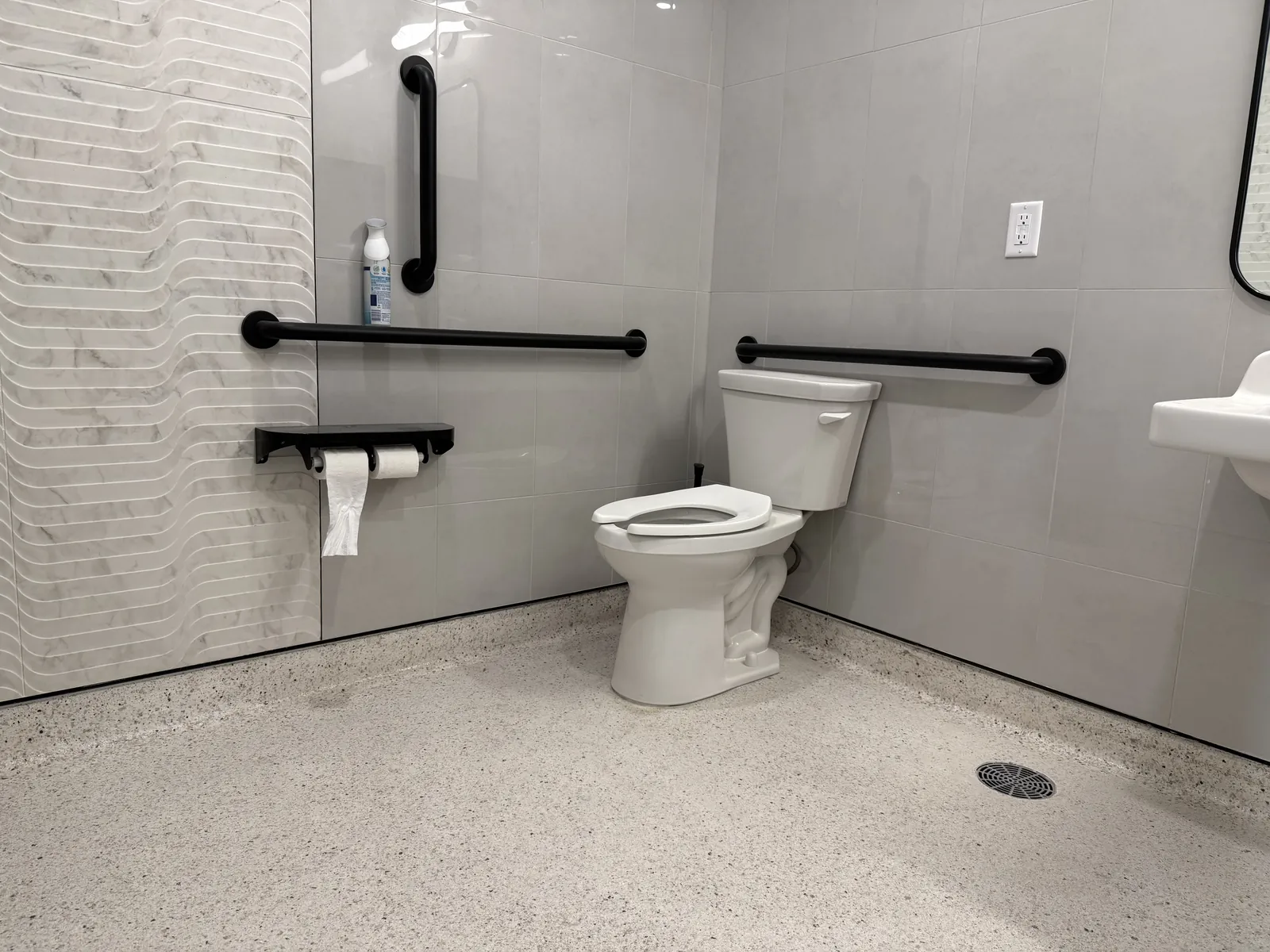 ADA restroom with seamless flake epoxy floor and cove base