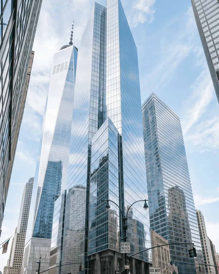 Glass office towers seen from street level