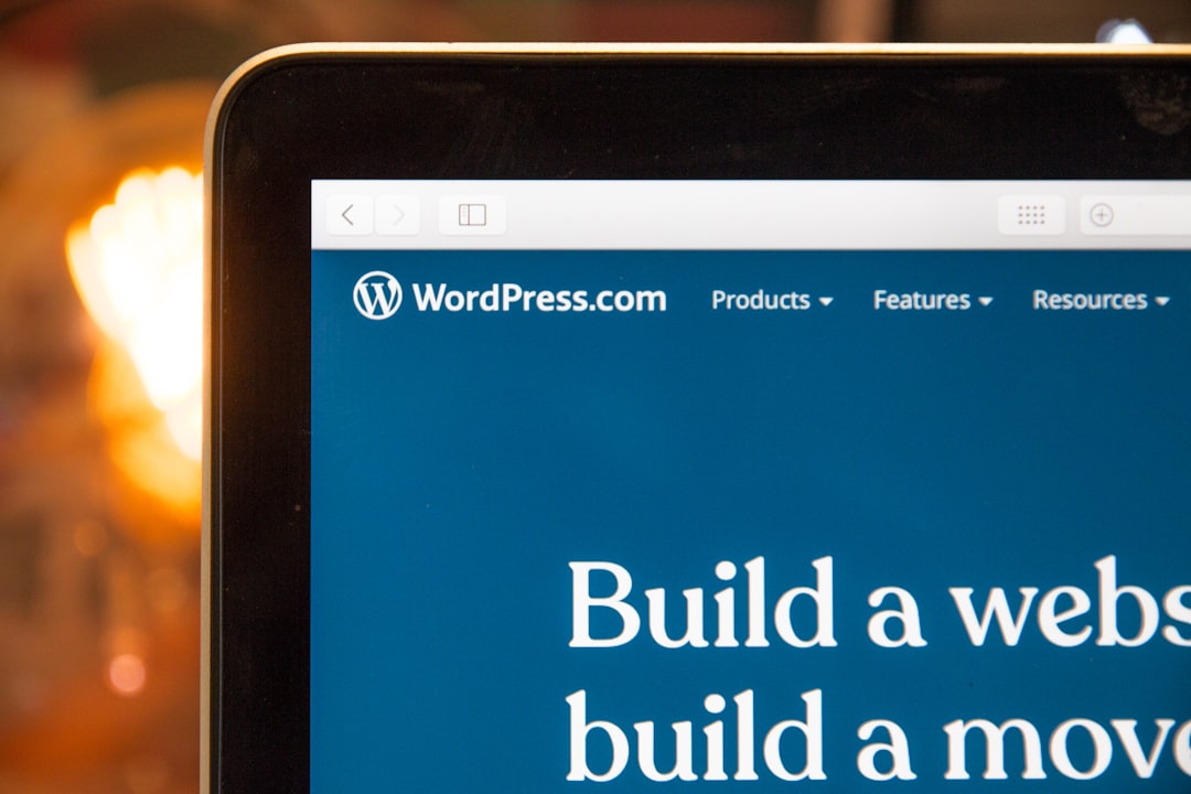 Desktop monitor displaying a website with conversion-focused call to action buttons and clean user interface design