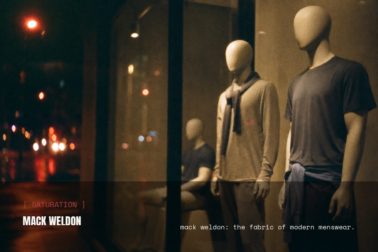 Mack Weldon campaign art in a night street scene