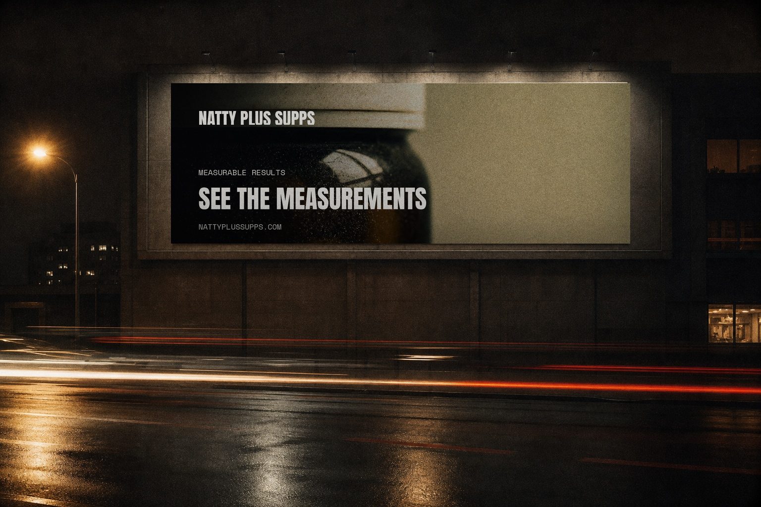 NattyPlus campaign billboard at night