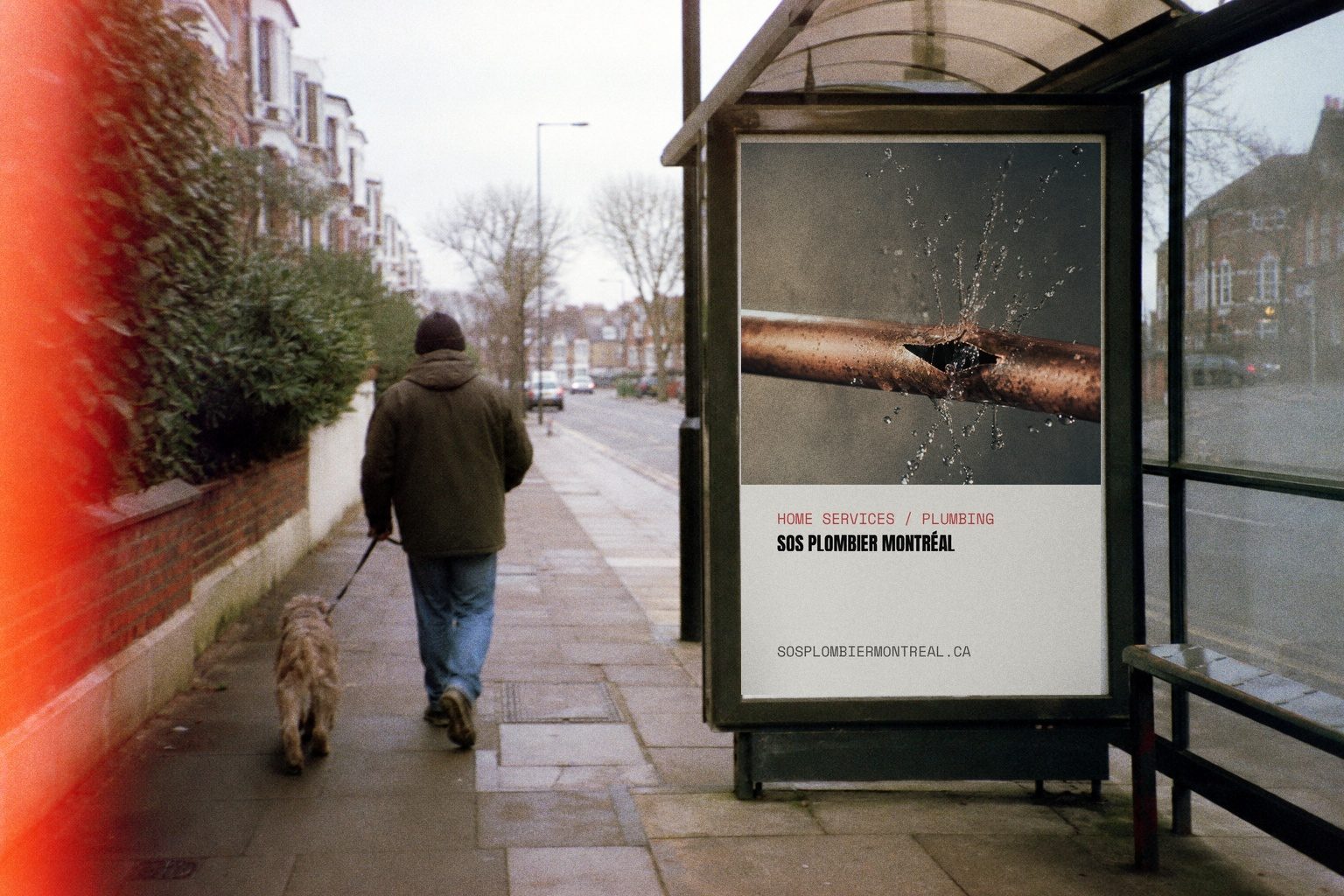 SOS Plombier campaign render — bus shelter poster