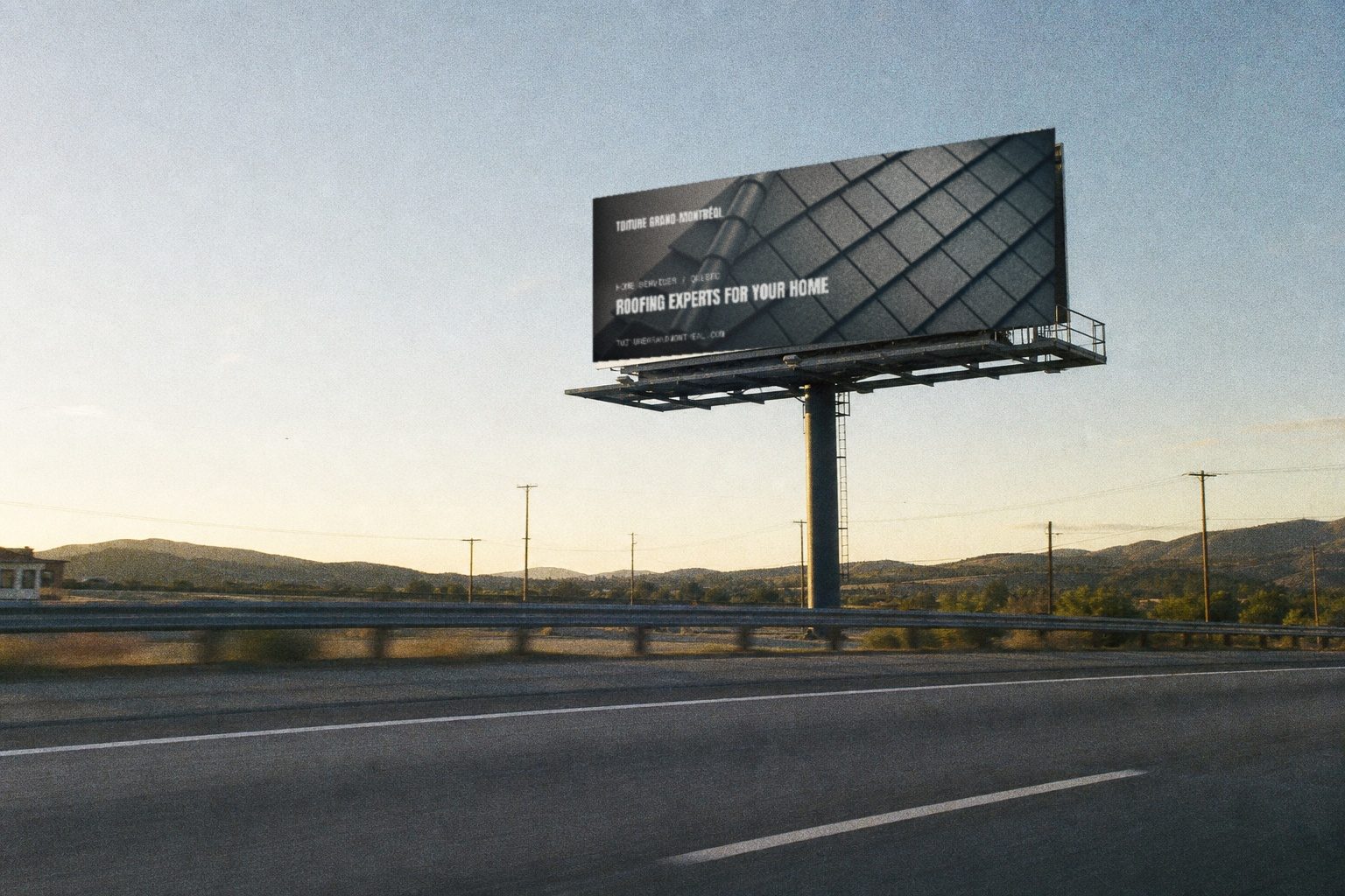 Toiture Grand-Montréal campaign creative on a highway billboard
