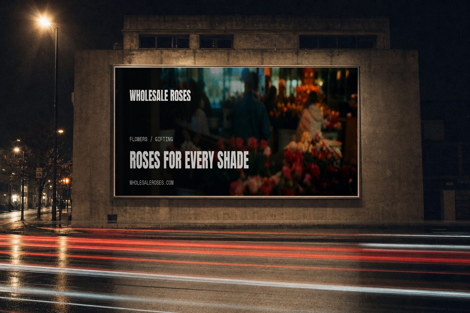 Wholesale Roses campaign render — night billboard