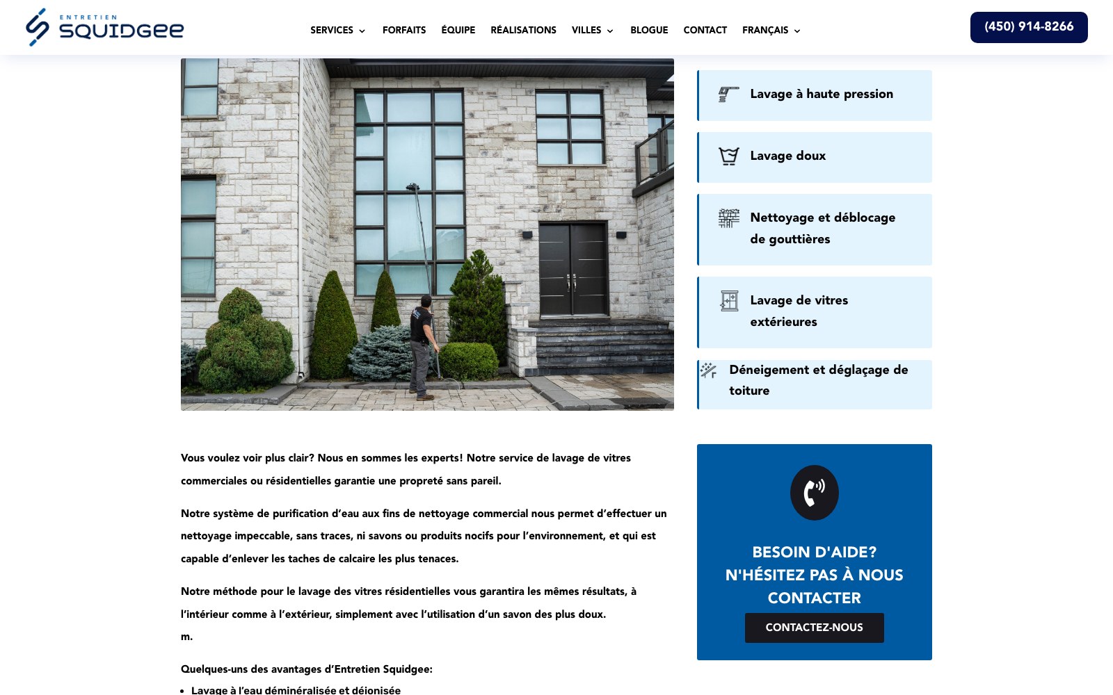 Soft wash service page showing a treated masonry facade