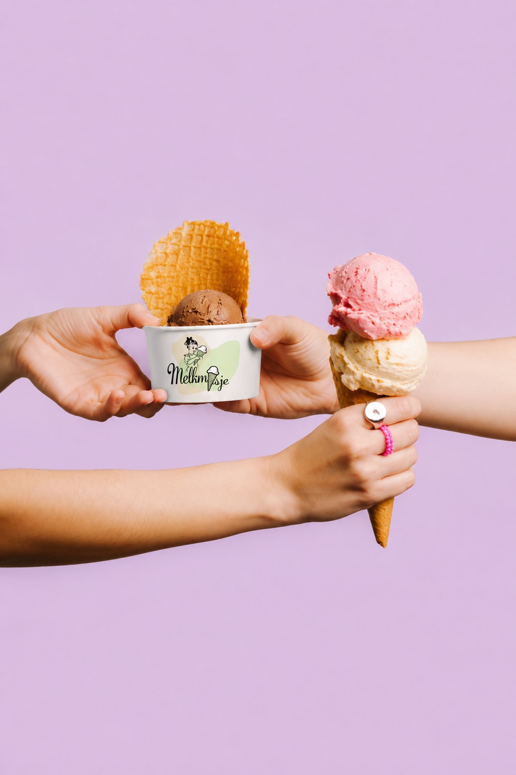 Two hands hold different ice cream servings: a cup with chocolate and a cone with strawberry and vanilla scoops.