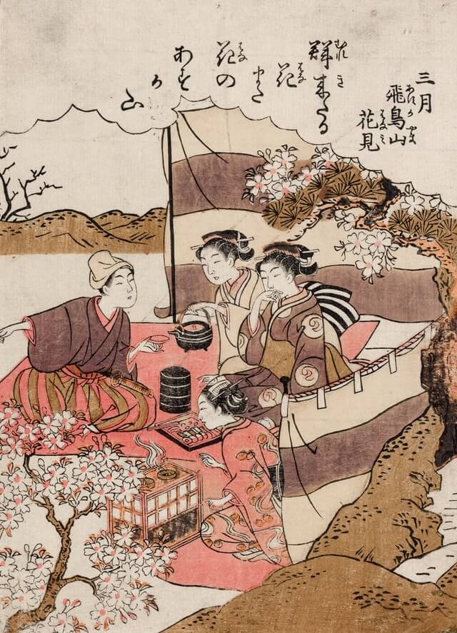 Hanging poems on a cherry tree. Woodcut by Ishikawa Toyonobu.