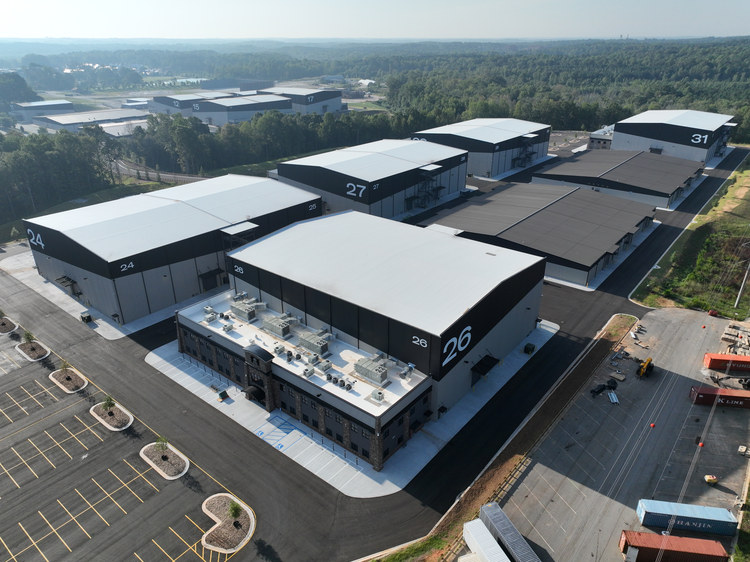 Aerial view of an industrial park with rooftop HVAC equipment