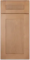 Light brown wooden cabinet door with a rectangular raised panel design.