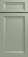 Rectangular sage green cabinet door with raised panel design and beveled edges.