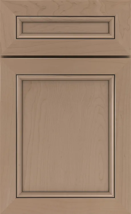 Light brown wooden cabinet door with two recessed panels and decorative molding.