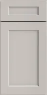 Light gray shaker-style cabinet door with recessed panel and rectangular handle slot.