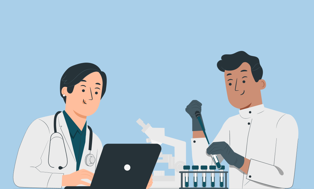 Two scientists in lab coats working with a laptop, microscope, and test tubes in a lab.
