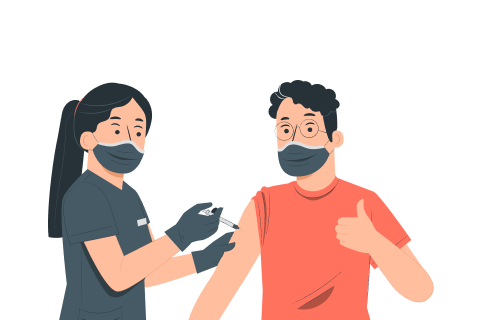 Healthcare worker in mask giving vaccine to masked person showing thumbs up wearing orange shirt.
