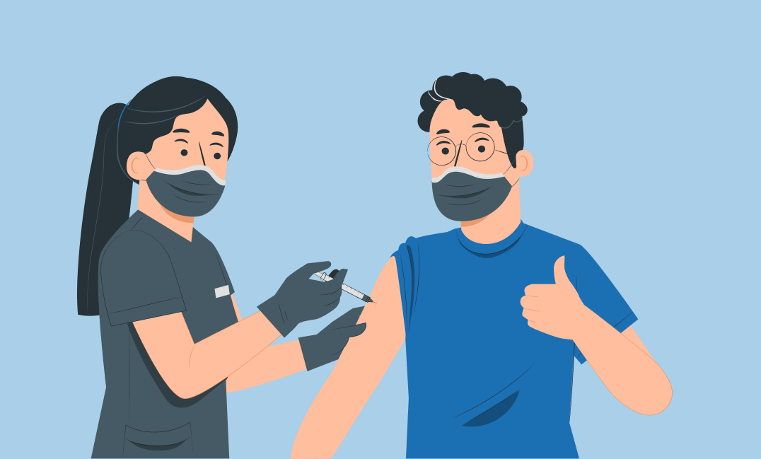 Healthcare worker wearing mask giving vaccine injection to a masked man showing thumbs up.