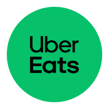 Green circle with black text saying Uber Eats, the food delivery service logo.