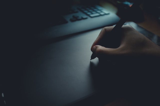 Handwriting notes in dark moody desk