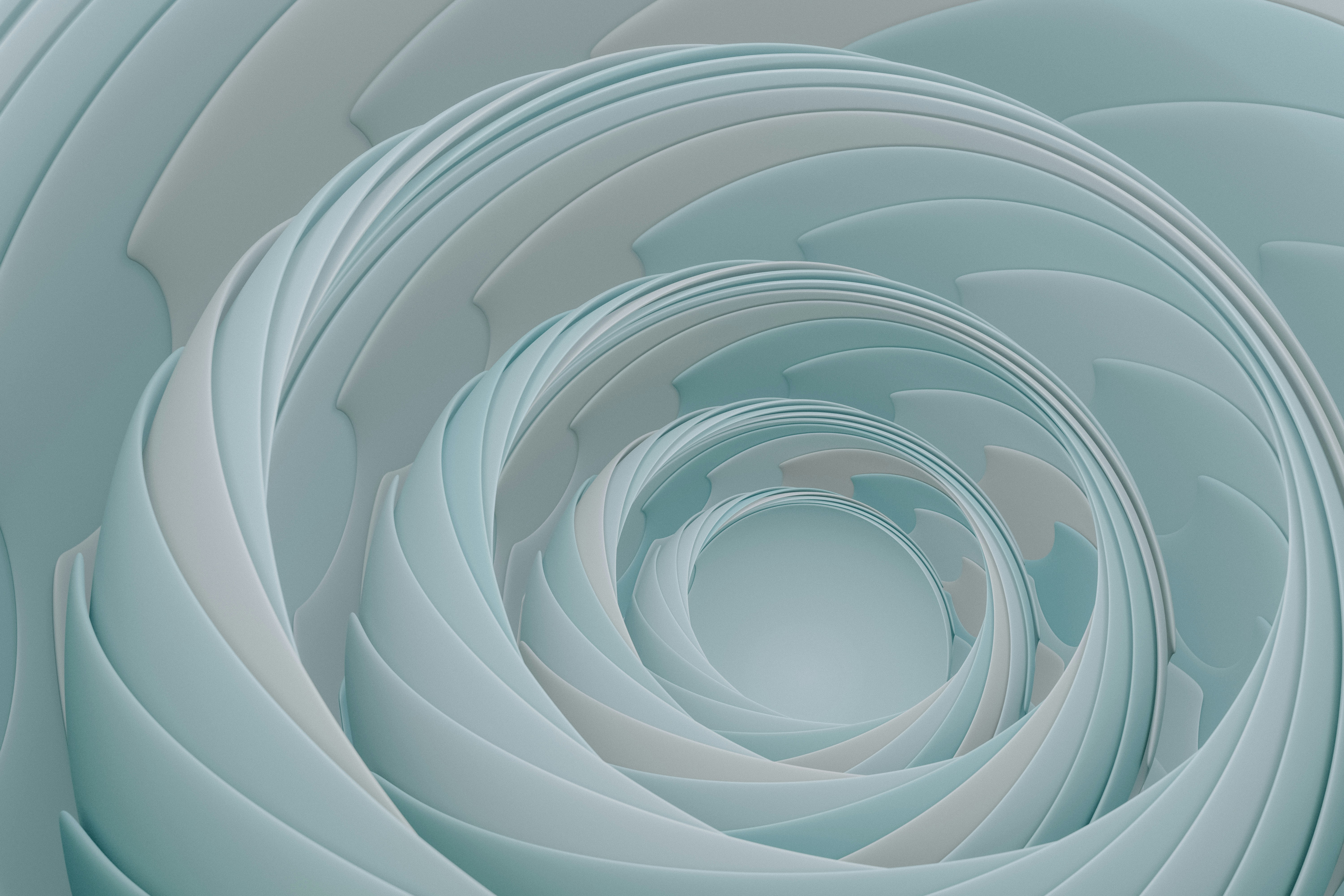 3D abstract cluster of smooth, rounded shapes in blue and cream on a gradient background.