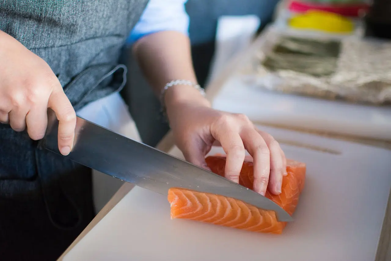 person-slicing-salmon