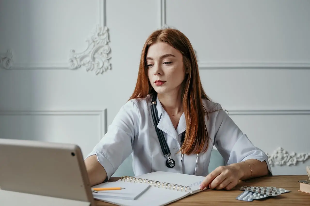 a-medical-doctor-working-behind-a-desk