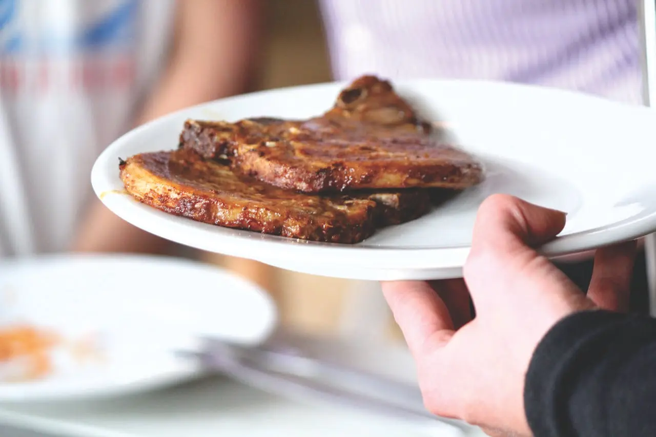 Two pieces of meat in a plate
