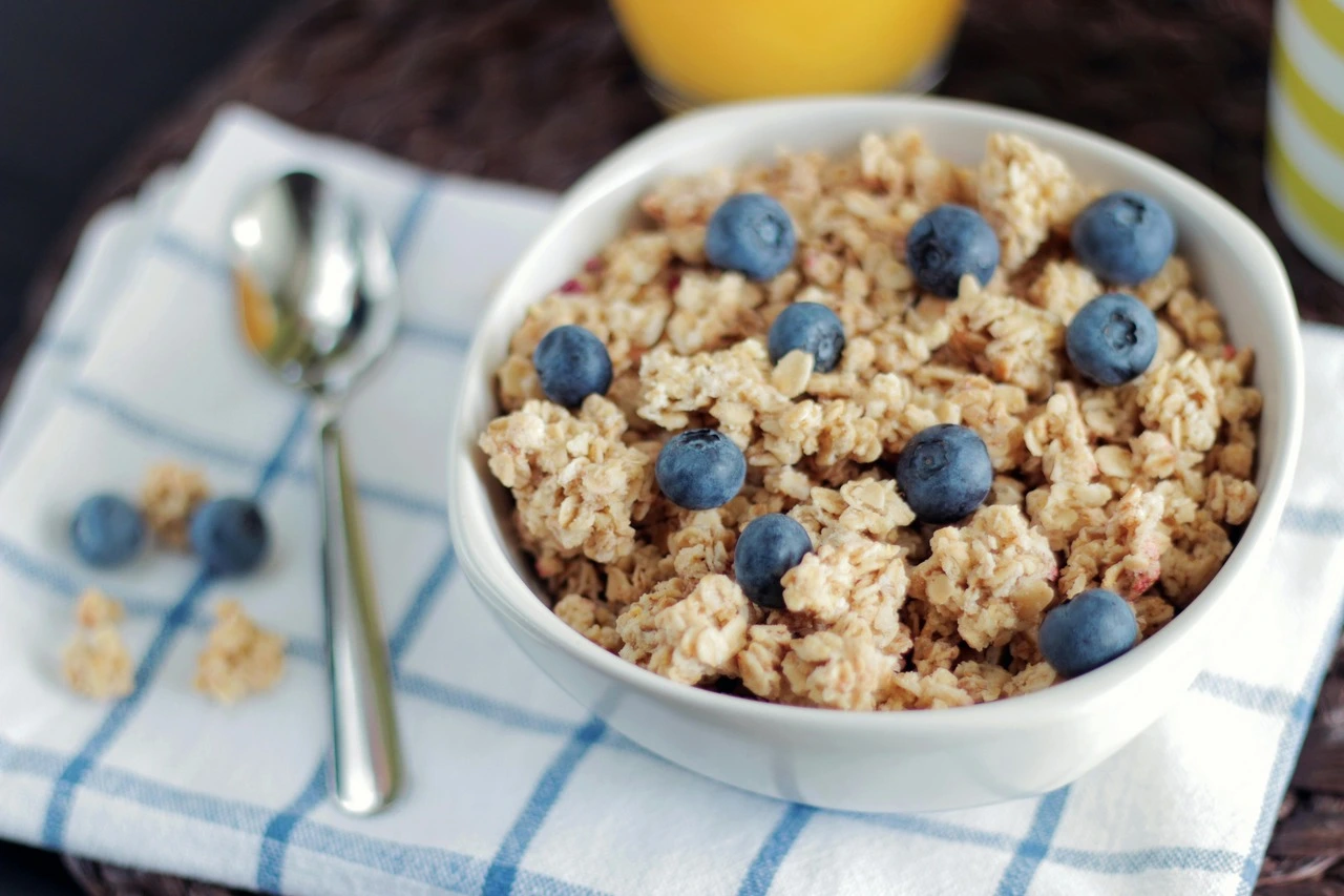 A bowl of oatmeal with blueberries