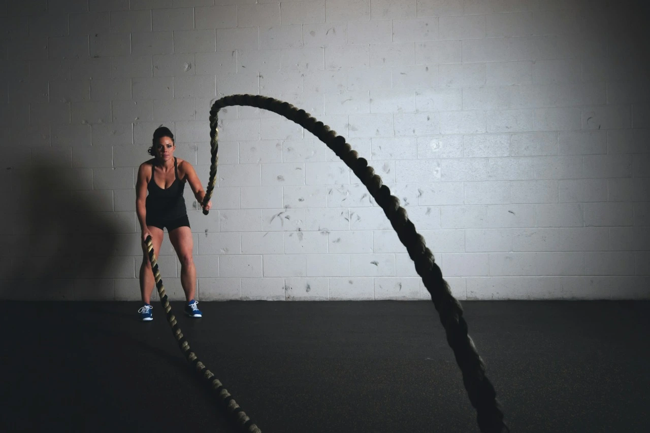 A woman doing rope exercises
