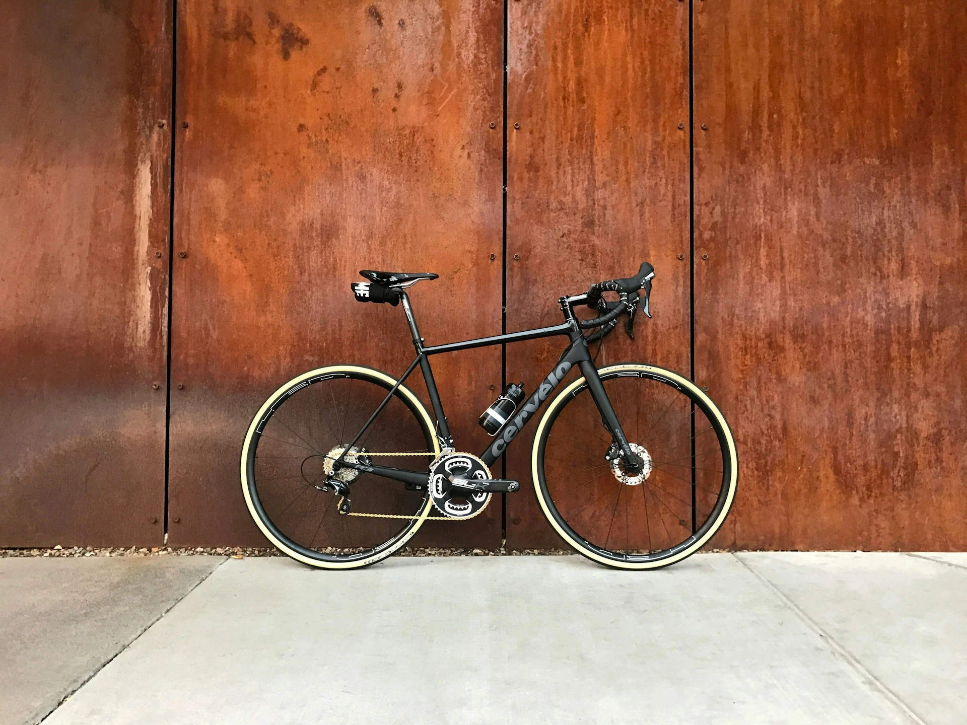 A bicycle against a wall