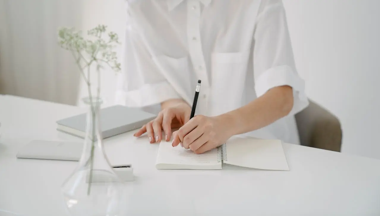 woman-writing-in-a-notebook