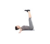 Person doing leg raise exercise on floor in gray workout clothing