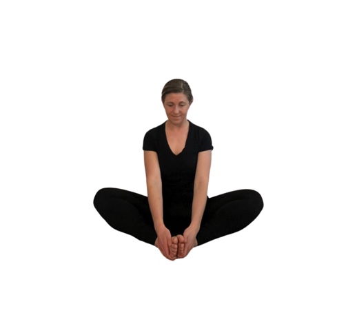 woman in black doing a bound angle.