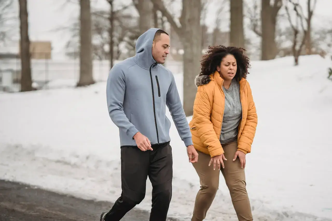 tired-overweight-black-woman-with-trainer-during-training