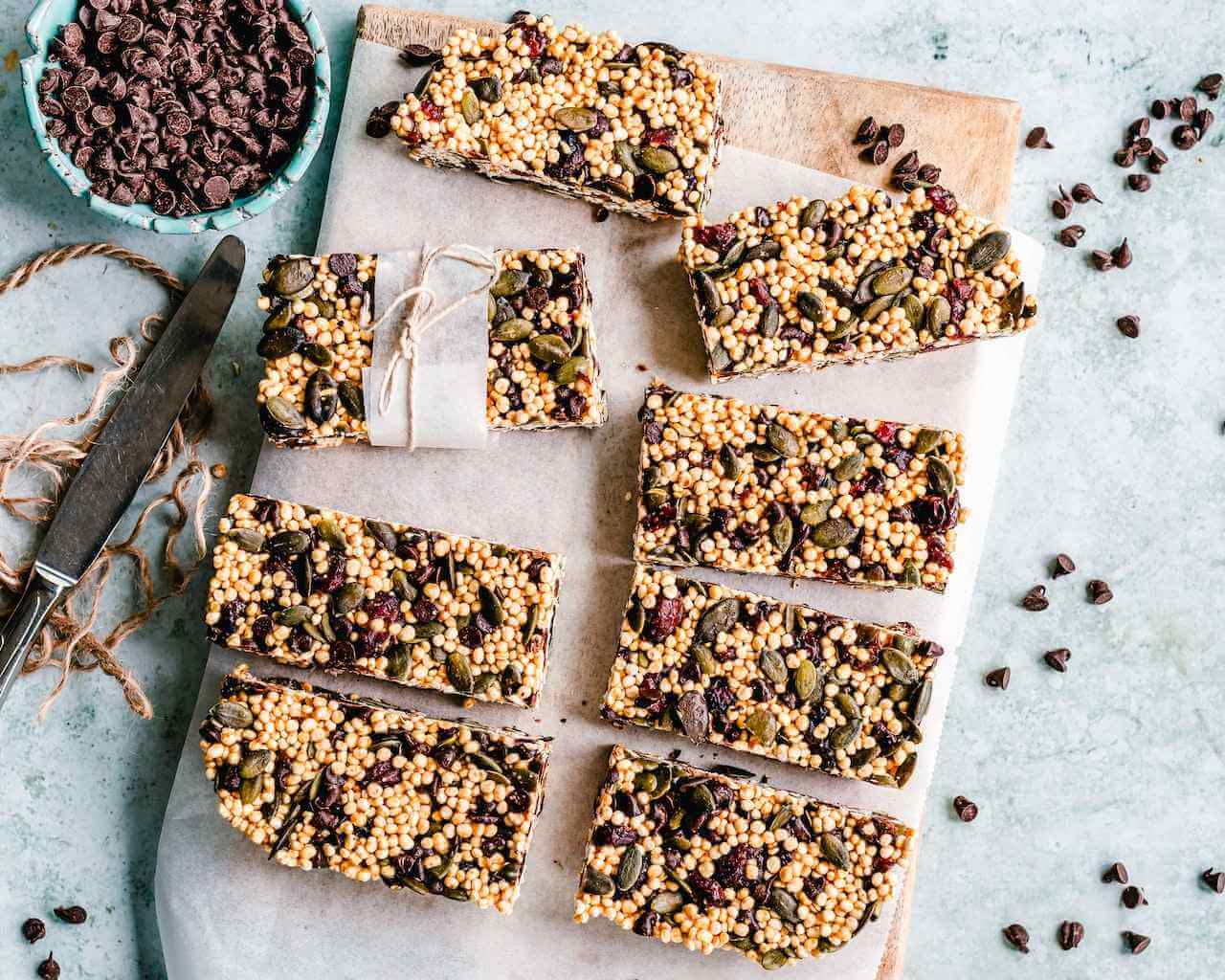 Homemade granola bars with seeds, chocolate chips, and dried fruit