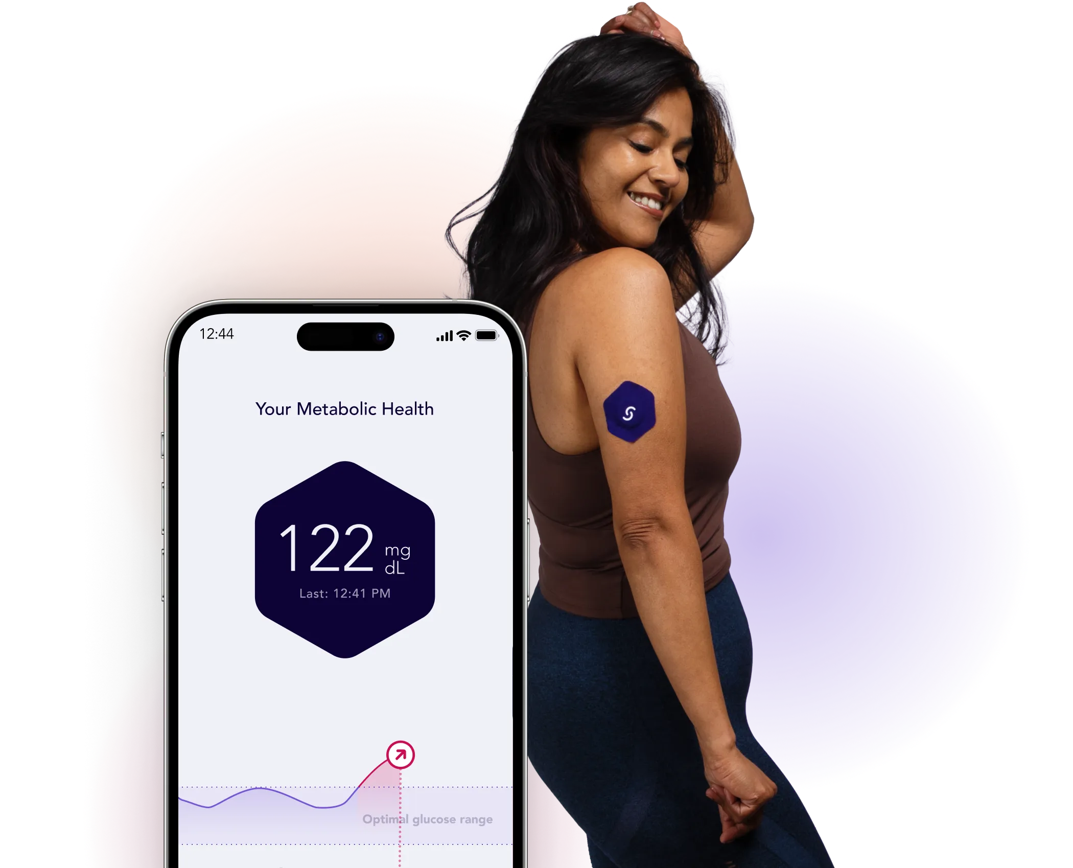 Woman wearing metabolic health tracker monitoring glucose levels on smartphone