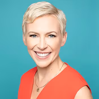 Portrait image of Dr. Heather Moday with a teal background.