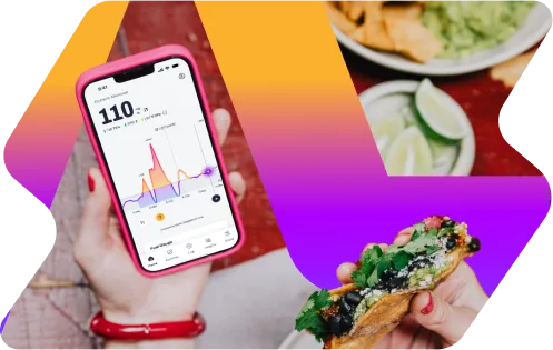 Smartphone displaying health app graph next to healthy food and avocado toast