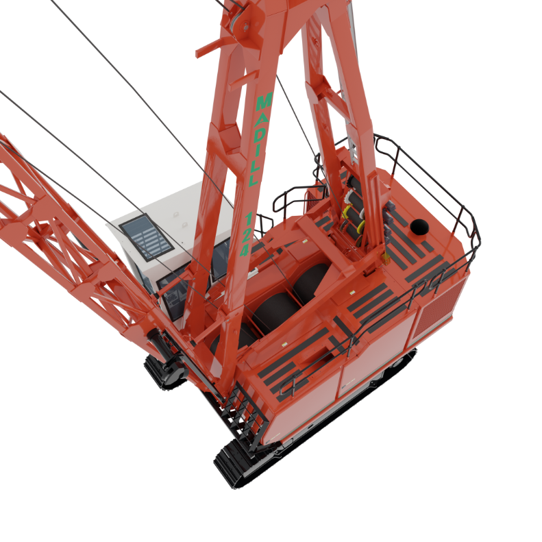 Top view of a red Madill 124 crane with cables, pulleys, and a white operator cabin.